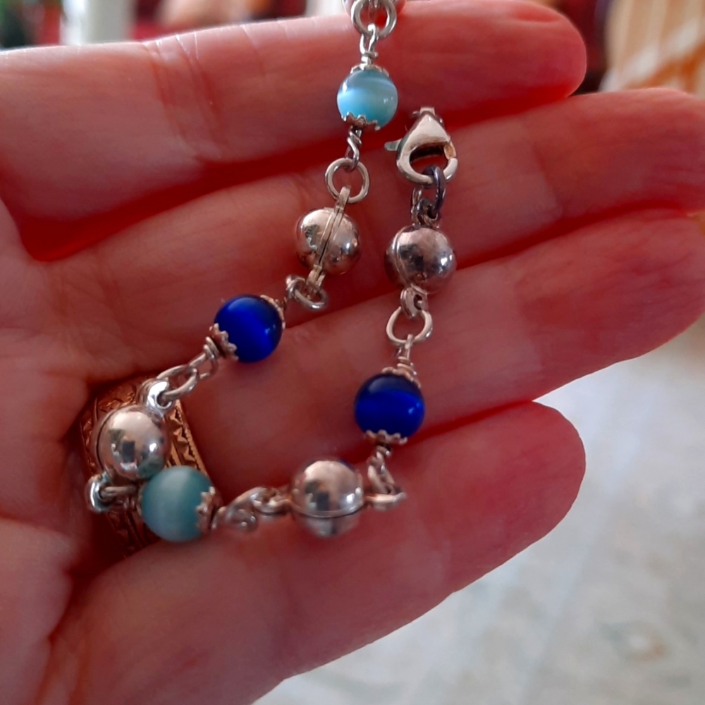 Sterling silver and blue stone bracelet.